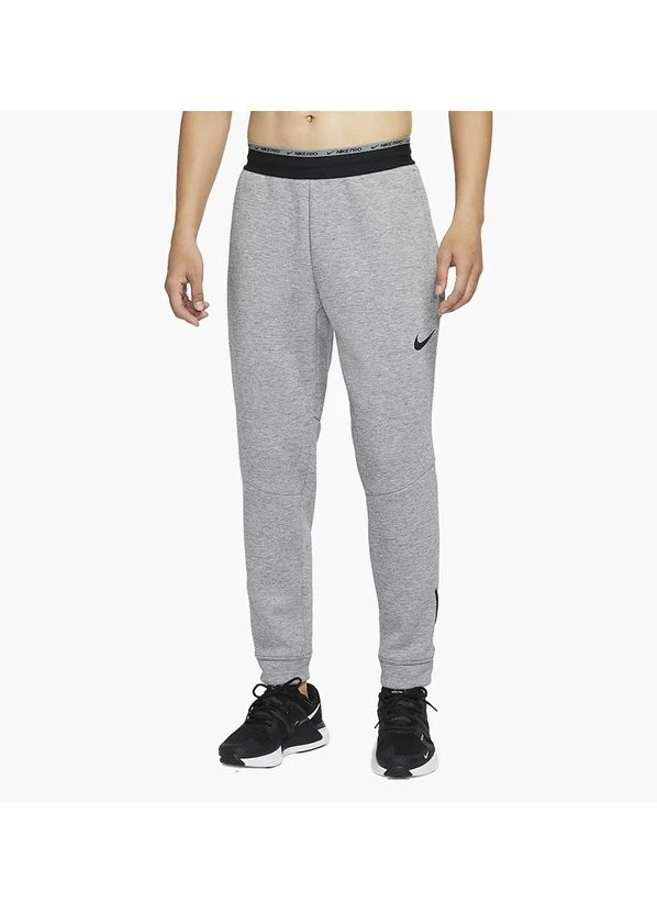 Брюки чоловічі Nike M Np Tf Npc Thrma Sphr Max Pnt (DD1880-010) — фото 1
