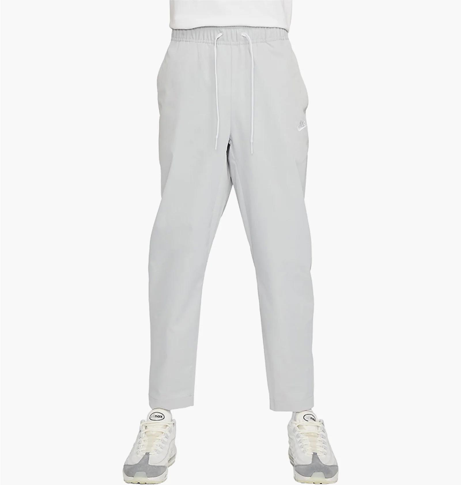 Брюки чоловічі Nike Woven Tapered Leg Pants (DX0623-077) — фото 3