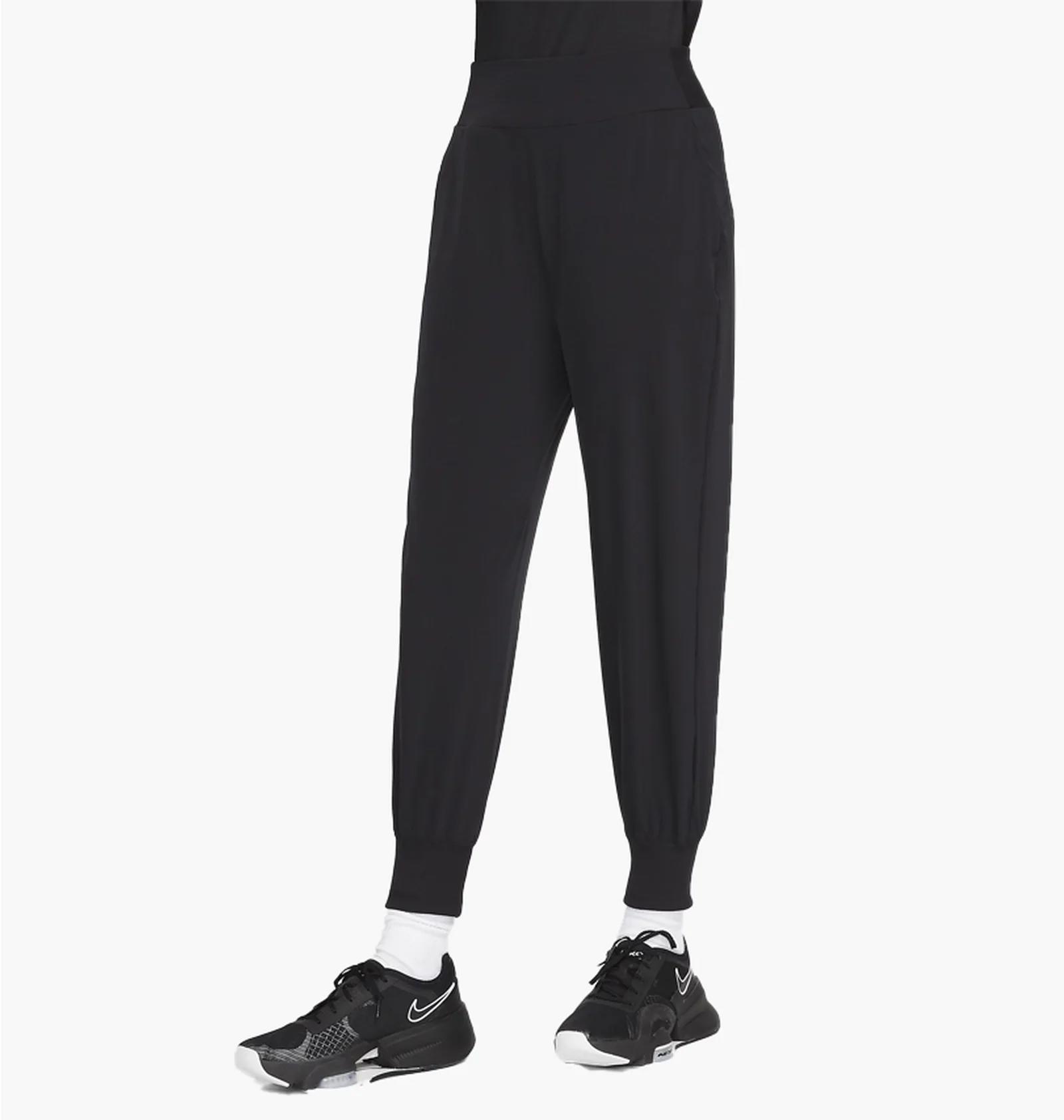 Брюки жіночі Nike Dri-Fit Bliss Mid-Rise 7/8 Joggers (DV9453-010) — фото 1
