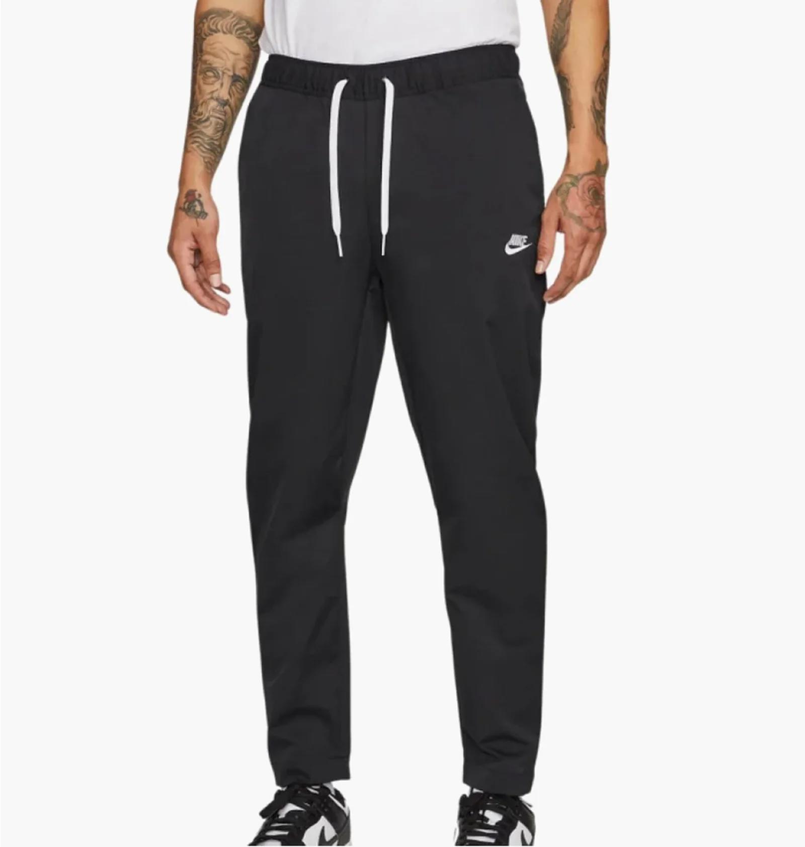 Брюки чоловічі Nike Club Wvn Taper Leg Pant (DX0623-010) — фото 1