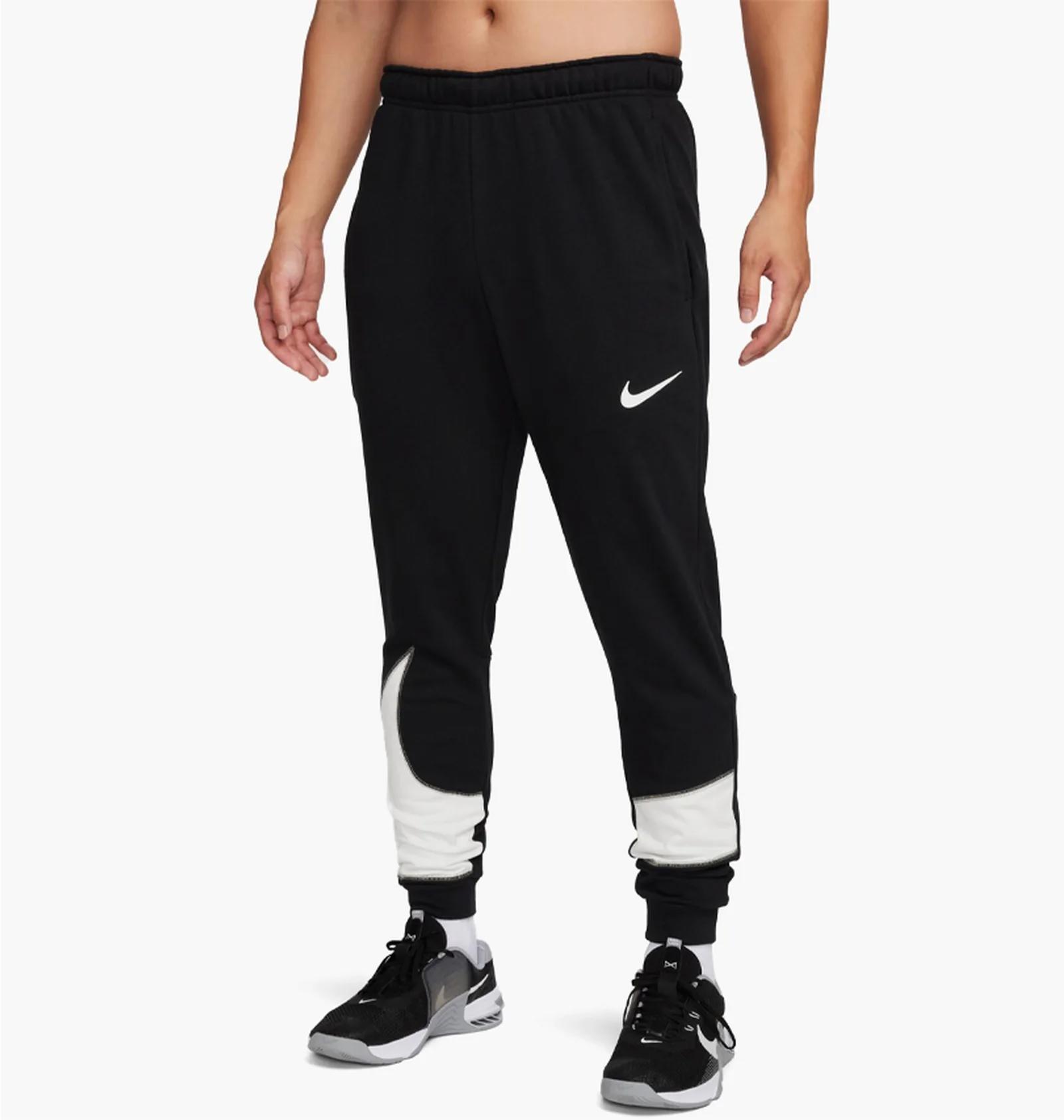 Брюки чоловічі Nike M Dri Fit Men Tapered (FB8577-010) — фото 1