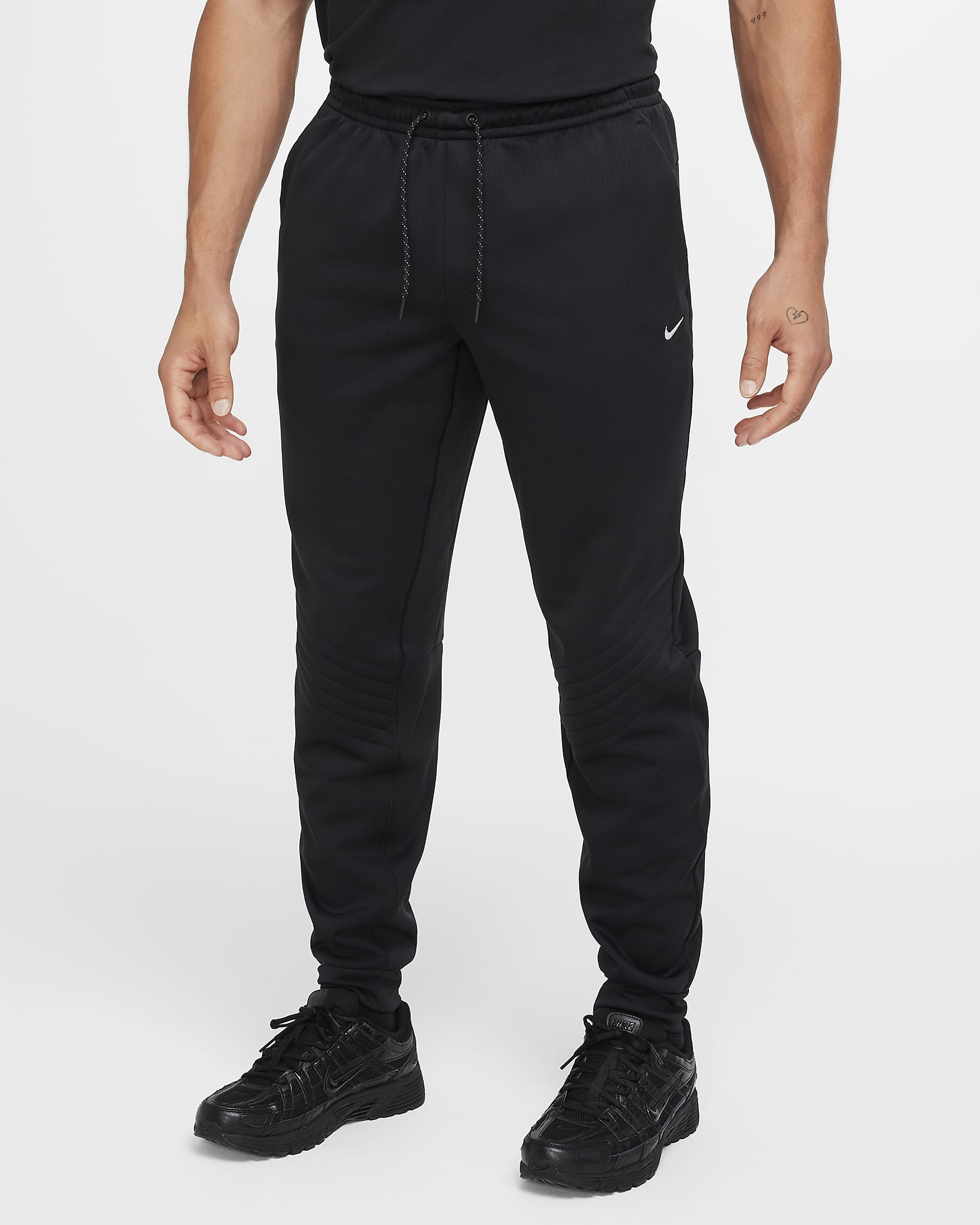 Брюки чоловічі Nike M Nk Tf Rpl Thrma Sphr Wnt Jgr (FZ1109-010) — фото 1