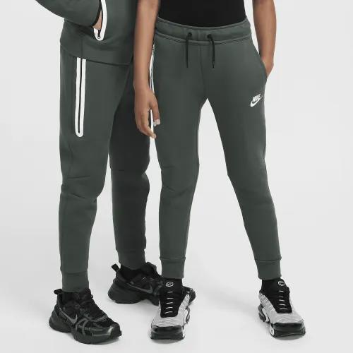 Брюки підліткові Nike Sportswear Tech Fleece Reflective Joggers (FZ5434-338) — фото 1