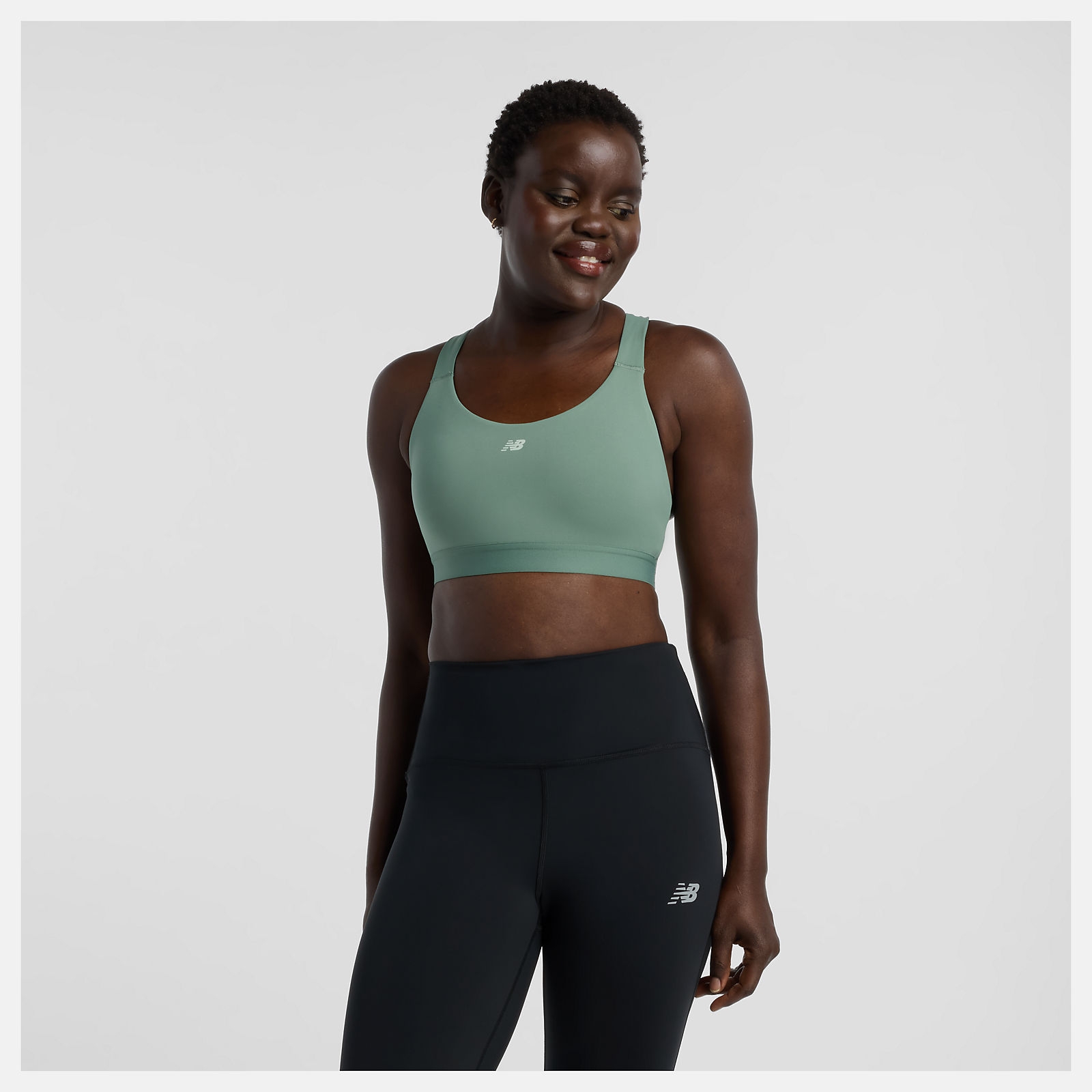 Спортивний топ New Balance Essential Train Bra — фото 1