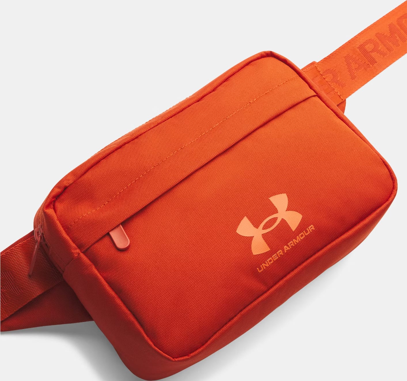 Сумка на пояс Under Armour Essential Lite WB Xbody 2L помаранчевий 15,3 x 24 x 10,5 см (1381914-842) — фото 1