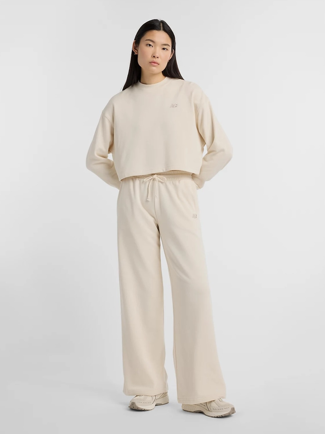 Брюки жіночі New Balance Coastal Fleece Beige (WP51503LIN) — фото 5