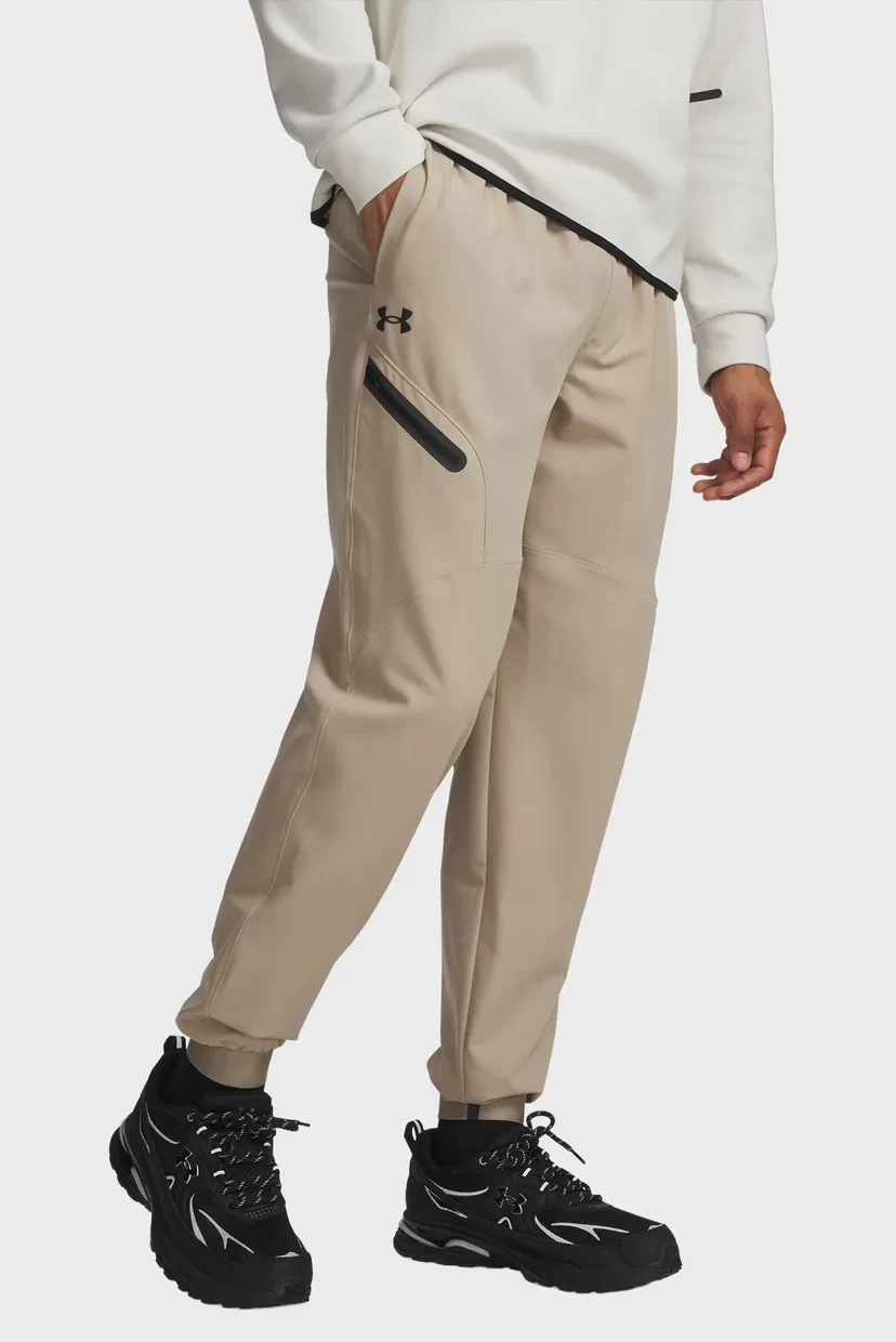 Спортивні штани UA Unstoppable Woven Jogger 1388823-299 Under Armour L Бежевий — фото 1