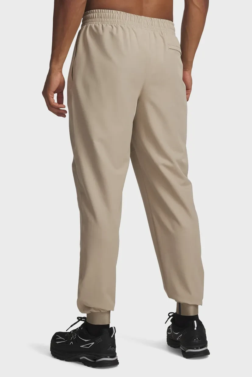 Спортивні штани UA Unstoppable Woven Jogger 1388823-299 Under Armour L Бежевий — фото 4