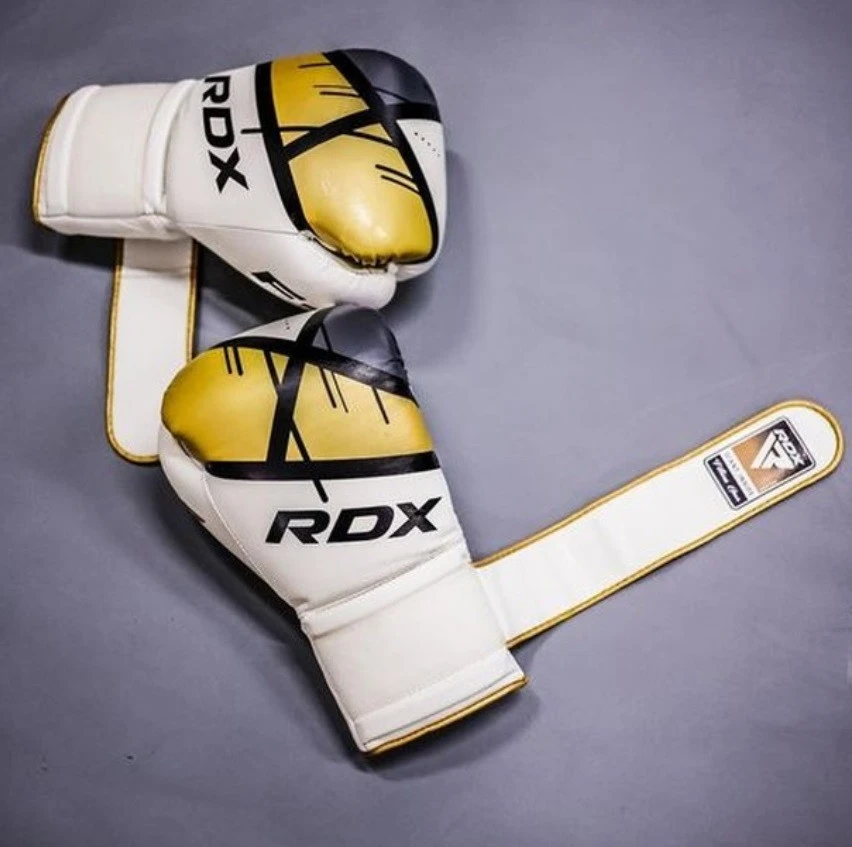 Боксерські рукавиці RDX F7 Ego Golden 8 унцій (капа в комплекті) — фото 1
