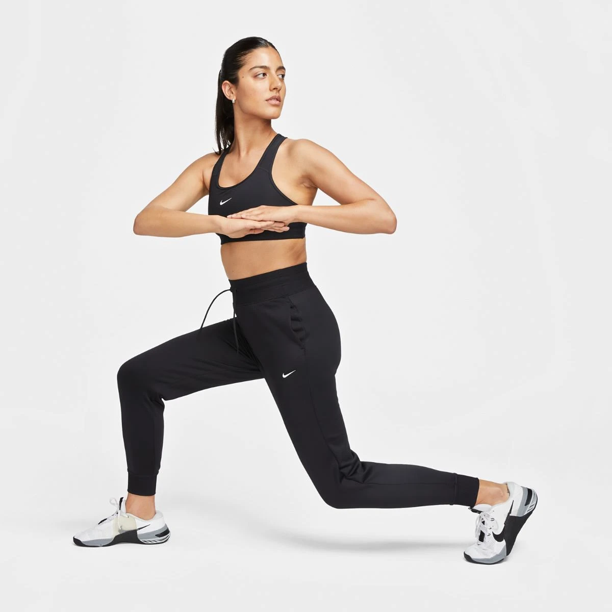 Брюки жіночі Nike Therma-Fit One High-Waisted 7/8 Joggers (FB5431-010) — фото 9