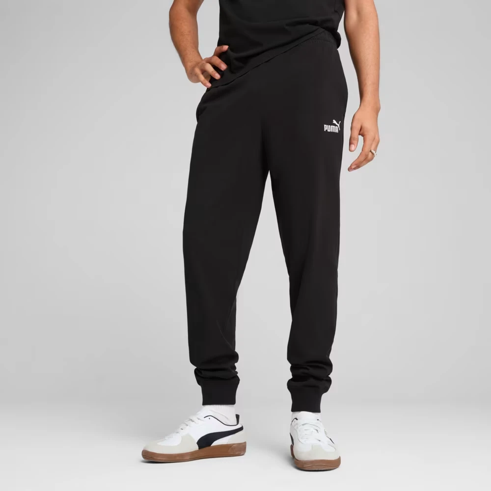 Спортивні штани ESS No. 1 Logo Jersey Pants 68261801 Puma S Чорний — фото 1