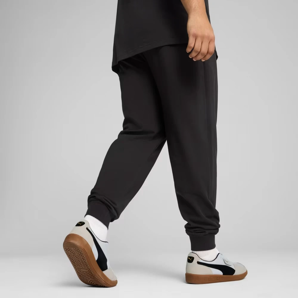 Спортивні штани ESS No. 1 Logo Jersey Pants 68261801 Puma S Чорний — фото 4