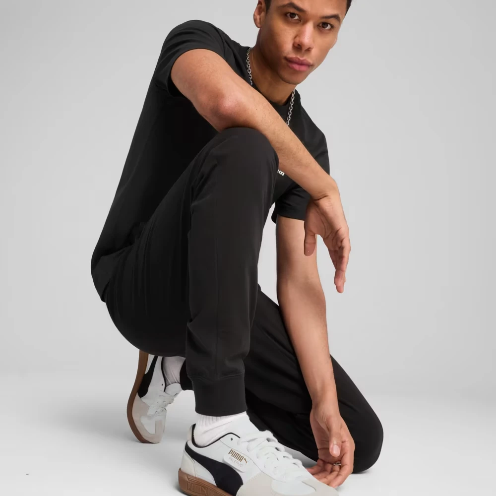 Спортивні штани ESS No. 1 Logo Jersey Pants 68261801 Puma S Чорний — фото 5
