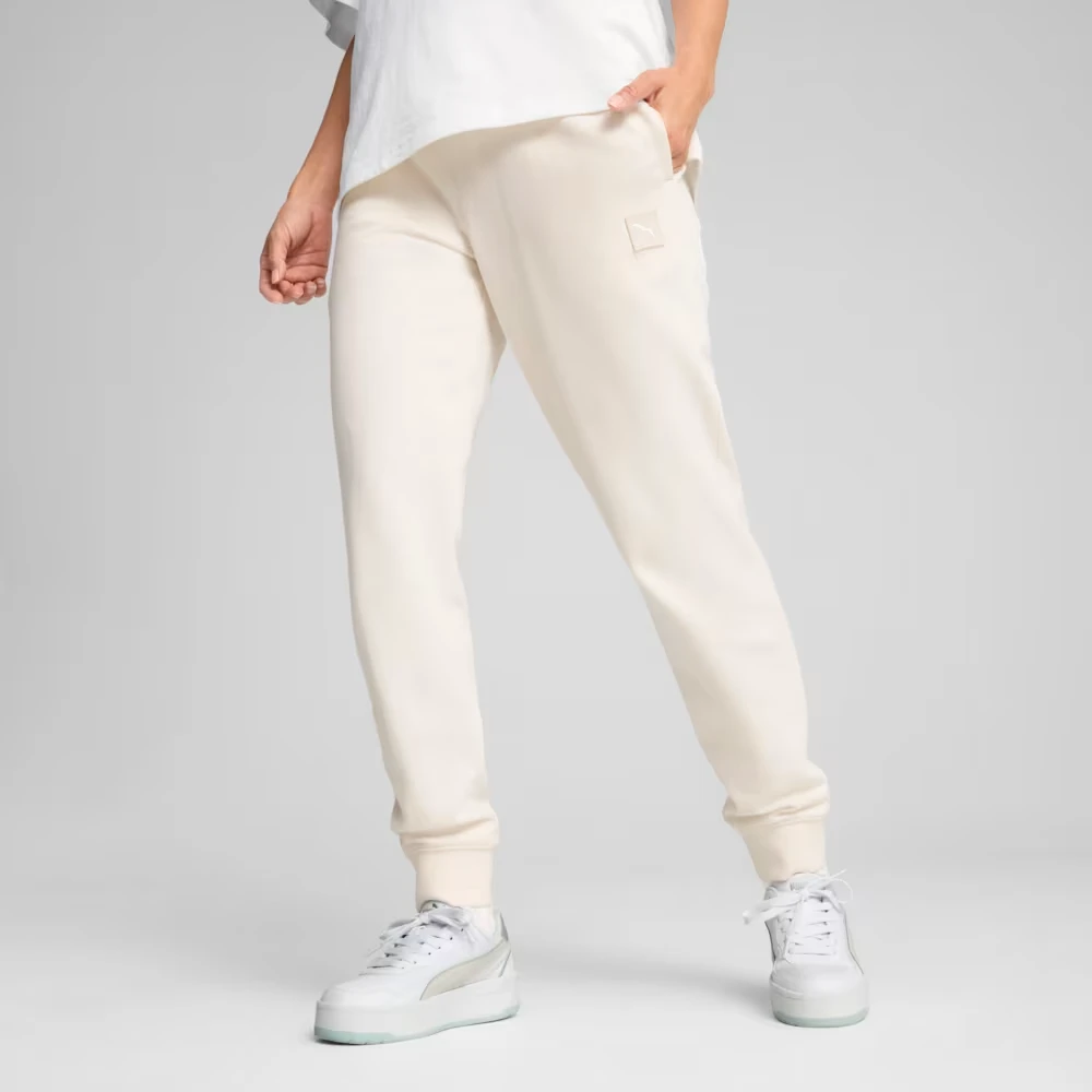Спортивні штани ESS ELEVATED Sweatpants 68501999 Puma L Кремовий — фото 1