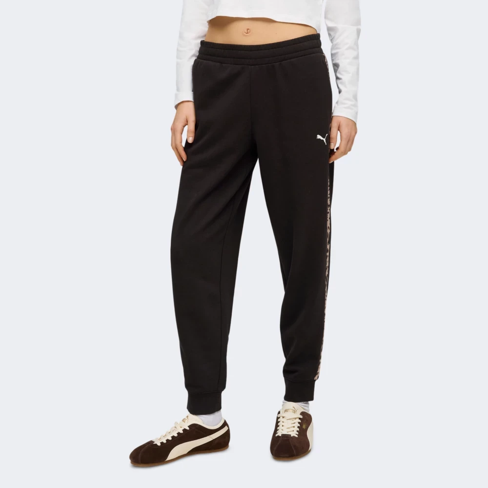 Спортивні штани ESS GRAPHIC Animal Pants 69246401 Puma L Чорний — фото 1