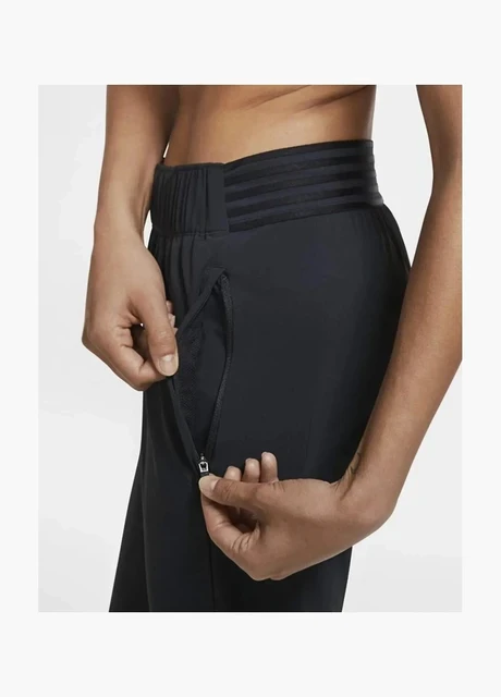 Брюки жіночі Nike Running Trousers Pants (DM1561-010) — фото 6