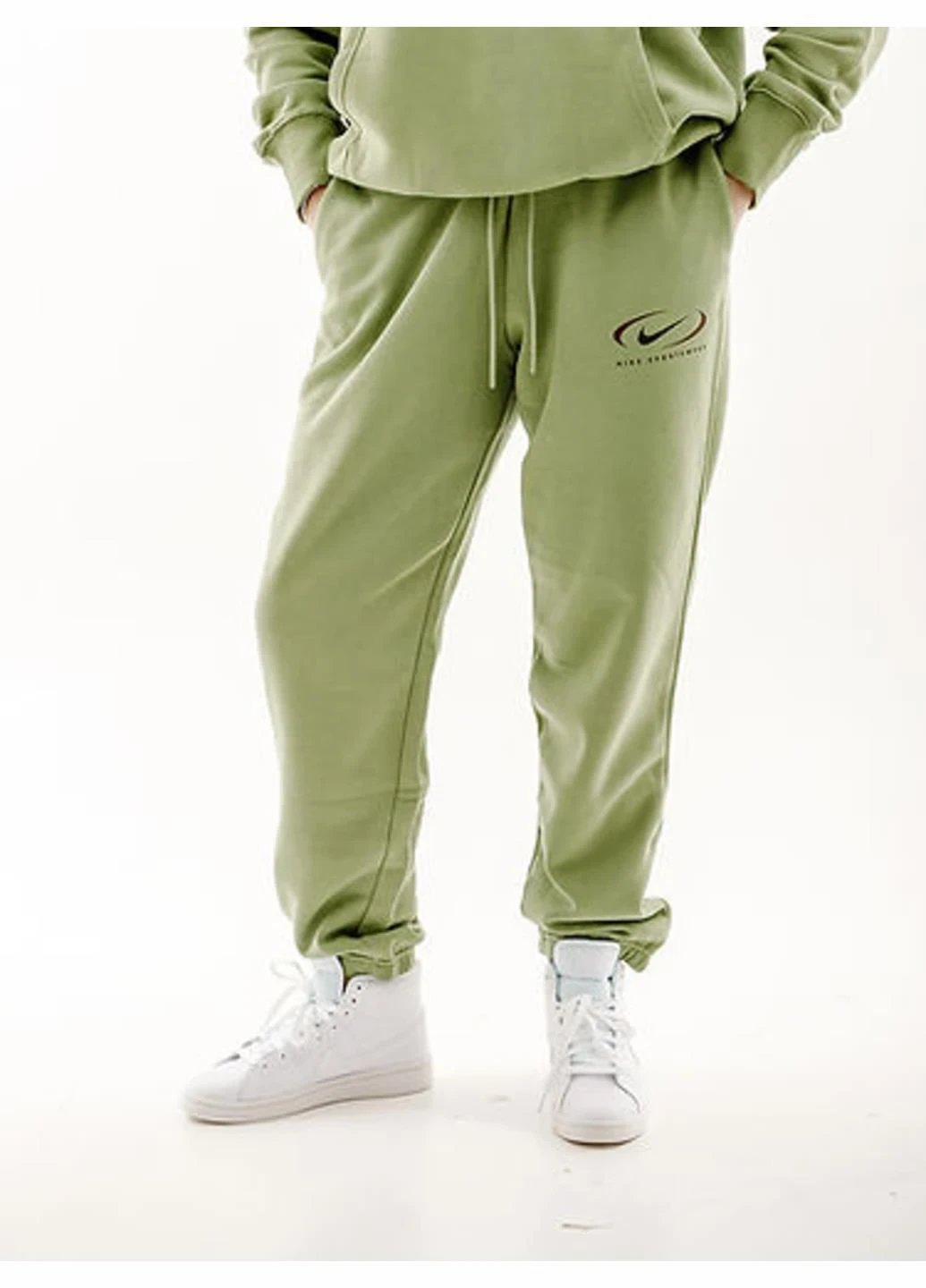 Брюки жіночі Nike Ns Phnx Flc Hr Os Pant Prnt (FN7716-386) — фото 1