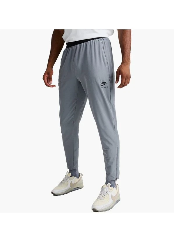Брюки чоловічі Nike Sportswear Air Max Woven Pants Green (FQ2207-065) — фото 1