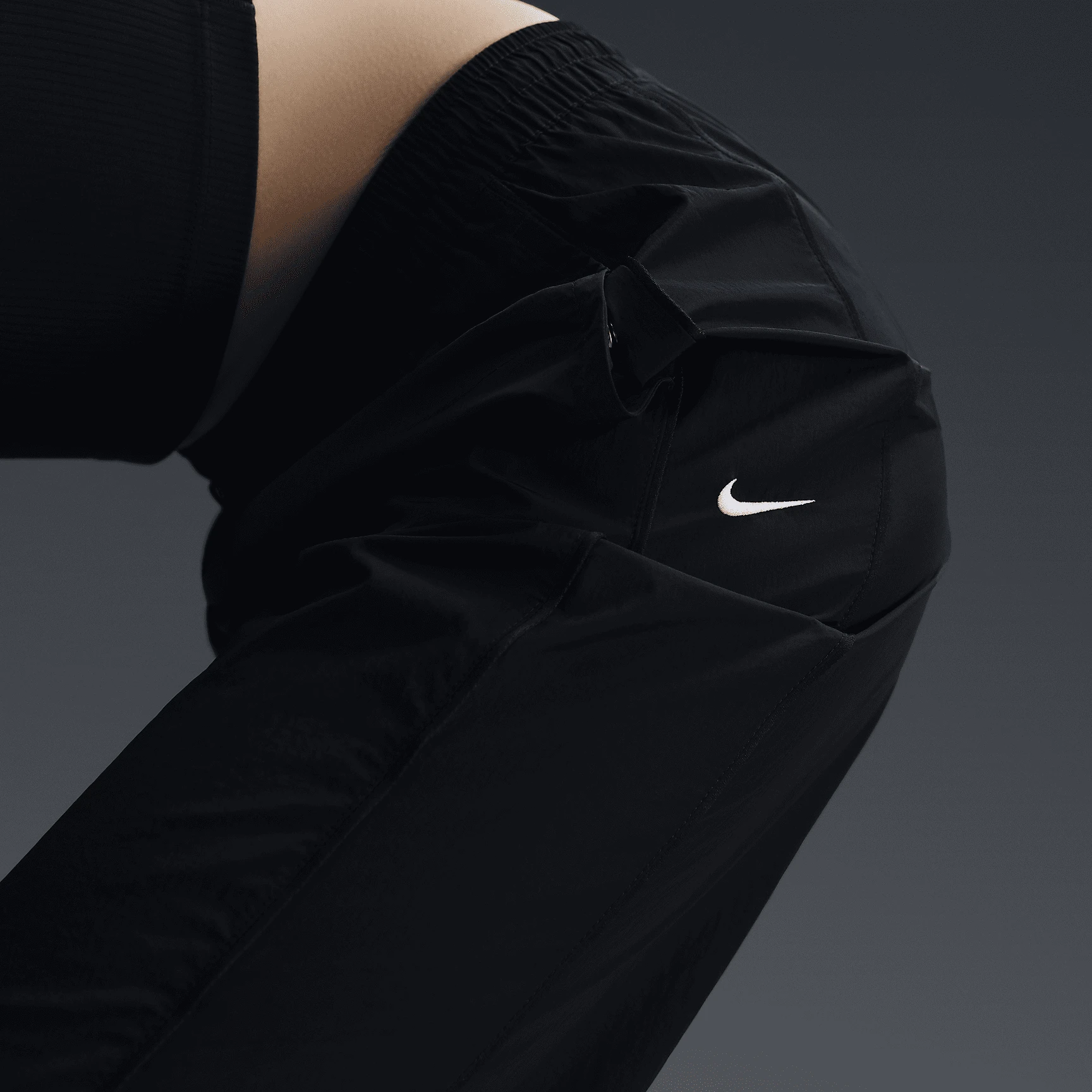 Брюки жіночі Nike Windrunner (FV7655-010) — фото 4