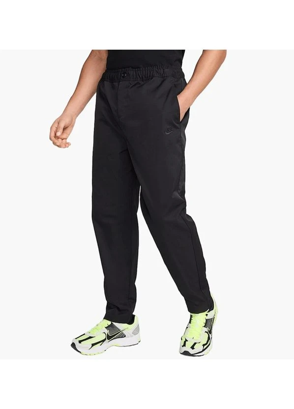 Брюки чоловічі Nike Wvn Taper Pant Black (HJ1997-010) — фото 1