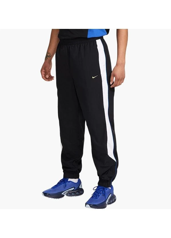 Штани Nike Sportswear Men's Woven Trousers — фото 1